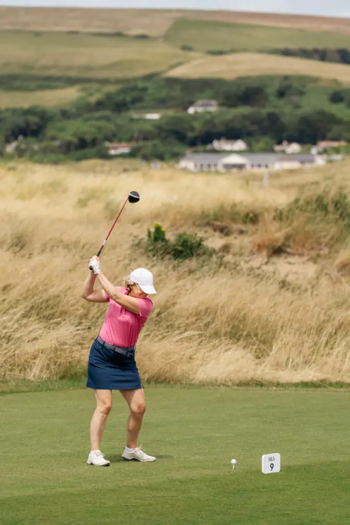 lady playing golf